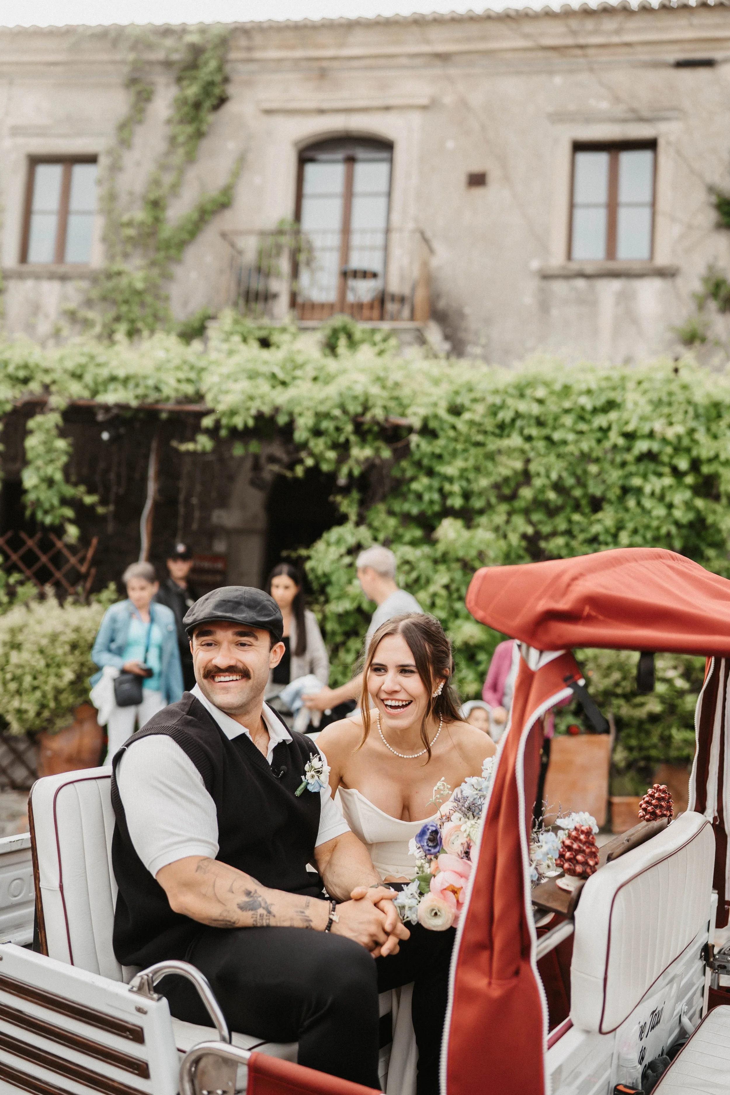 The photoshoot in front of Bar Vitelli with a typical Sicilian APE car.