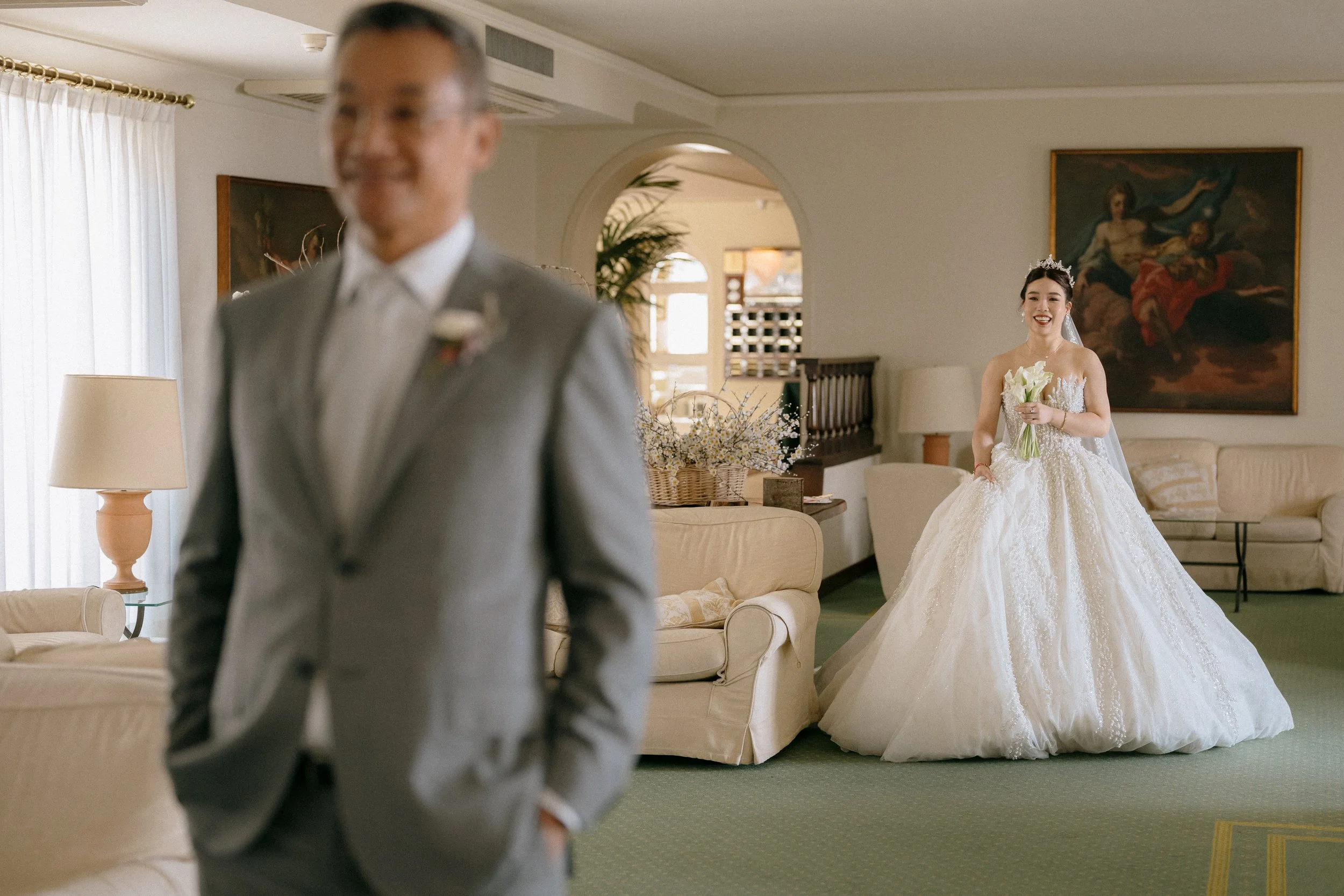 The bride's first look with her father. Chinese Wedding in Sicily.