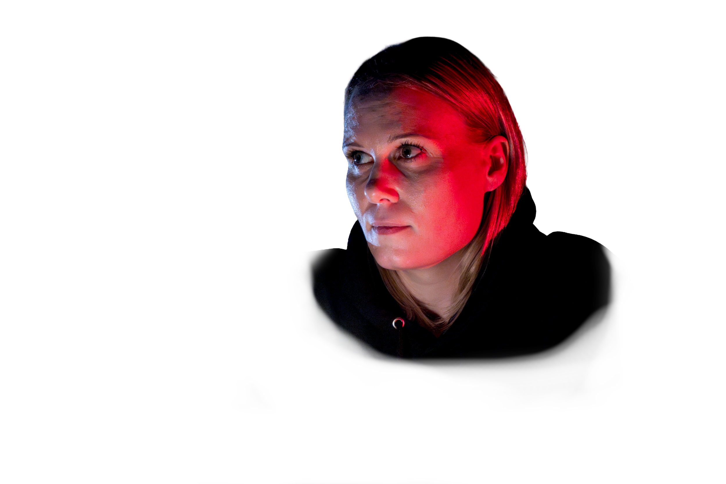 A woman with blonde hair looking to the left, illuminated by red and blue lights, with a dark background.