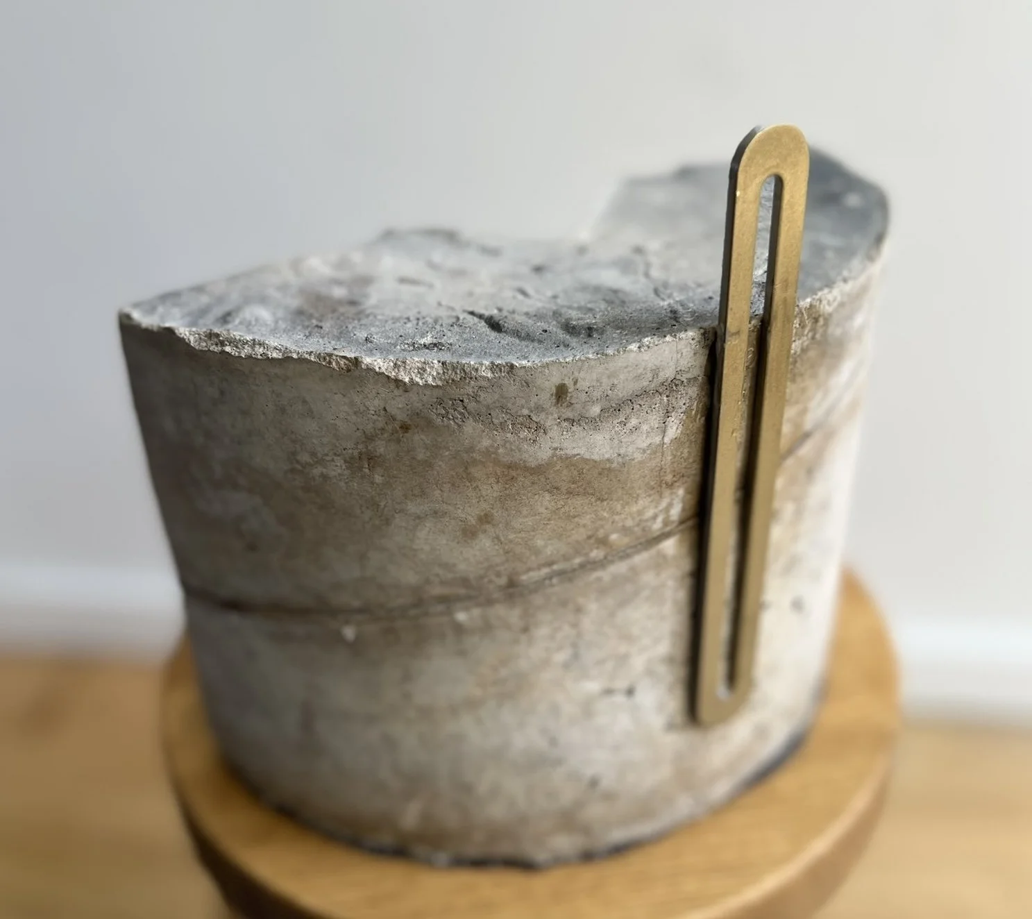 Concrete base with steel bracket