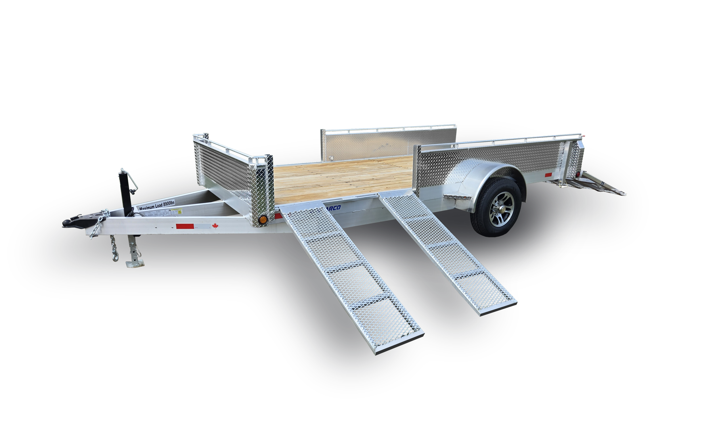 Silver flatbed trailer with wooden flooring, two metal ramps, and a diamond plate metal side railing, on black background.