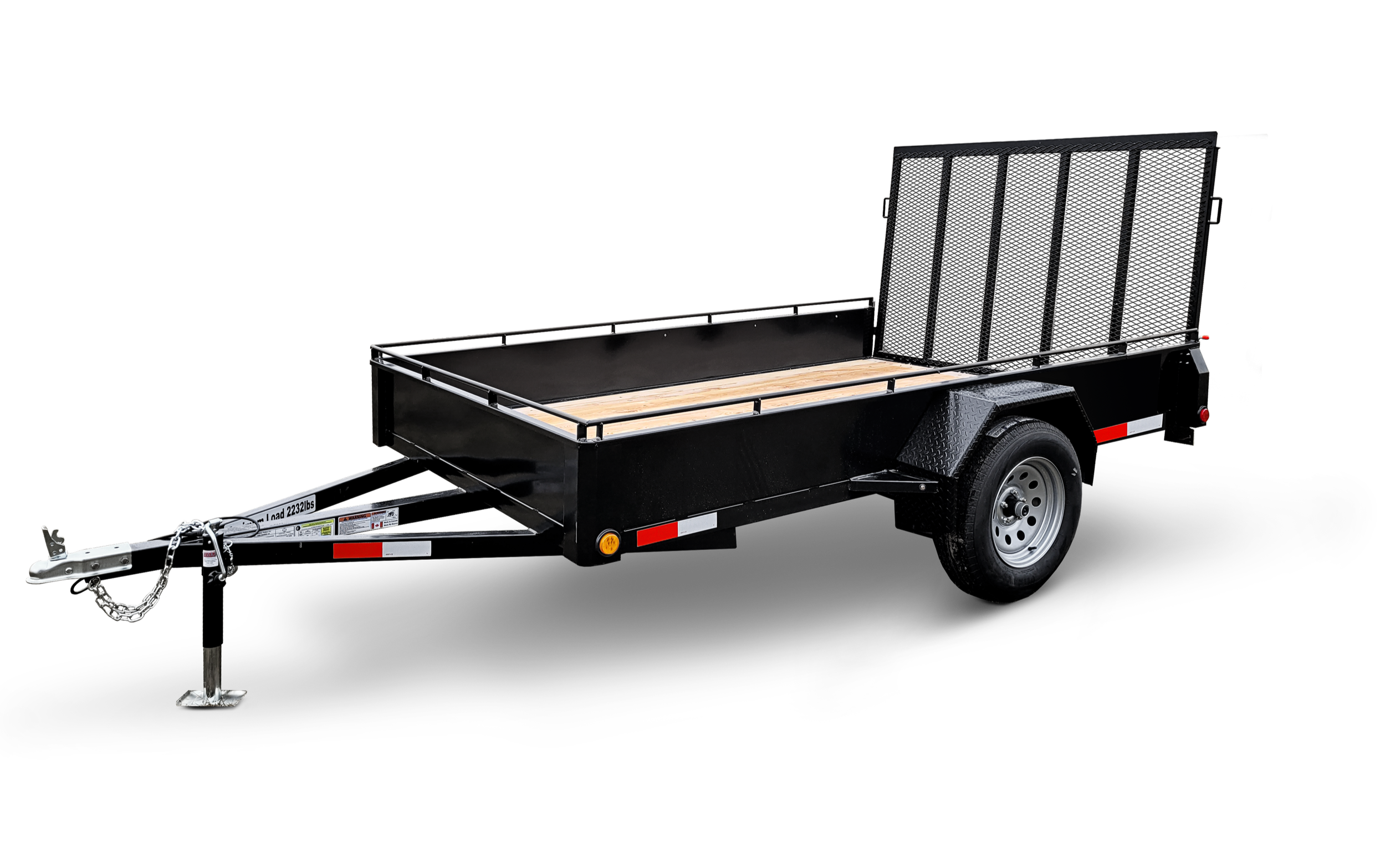 Black utility trailer with a flatbed and a tilting ramp, connected to a hitch with safety chains, isolated on black background.