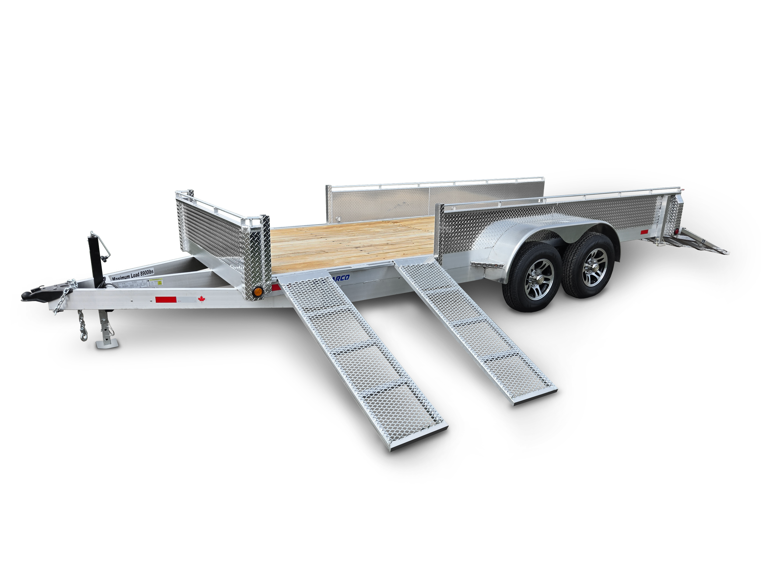 Silver flatbed utility trailer with foldable ramps and dual axles, set against a black background.