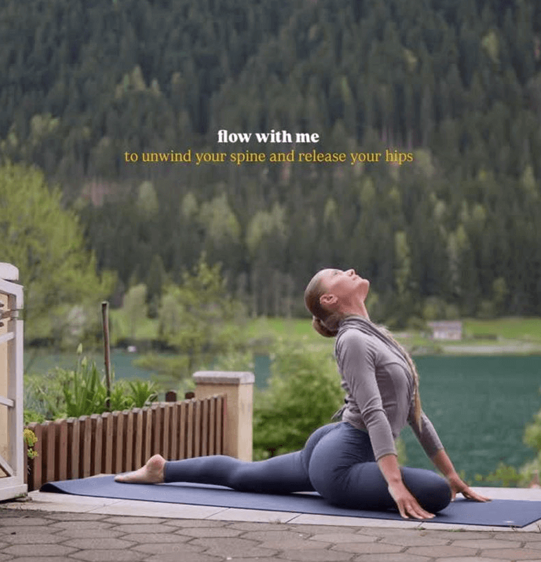 Andrijana Darkov in Pigeon pose during an outdoor online yoga class
