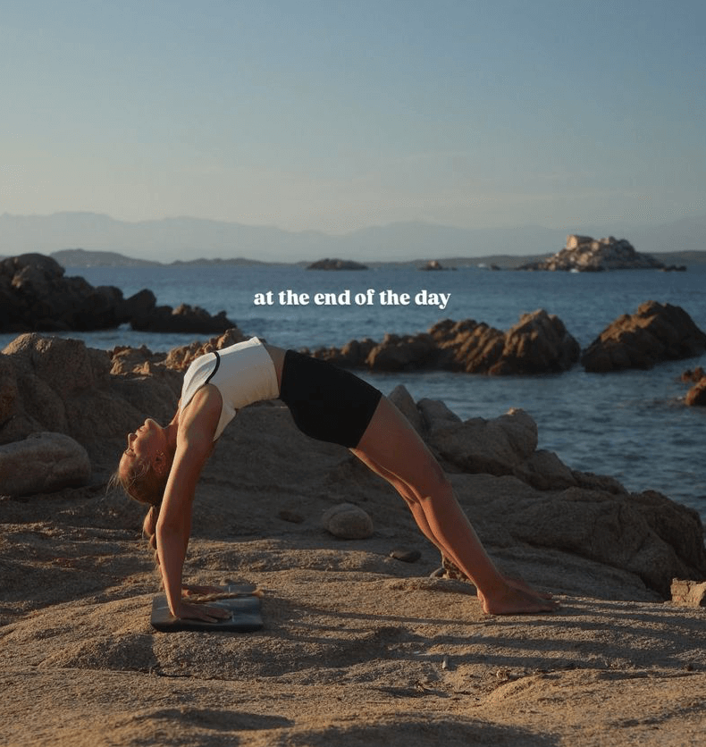 Andrijana Darkov practicing Wheel pose for a collaboration with Monday Body