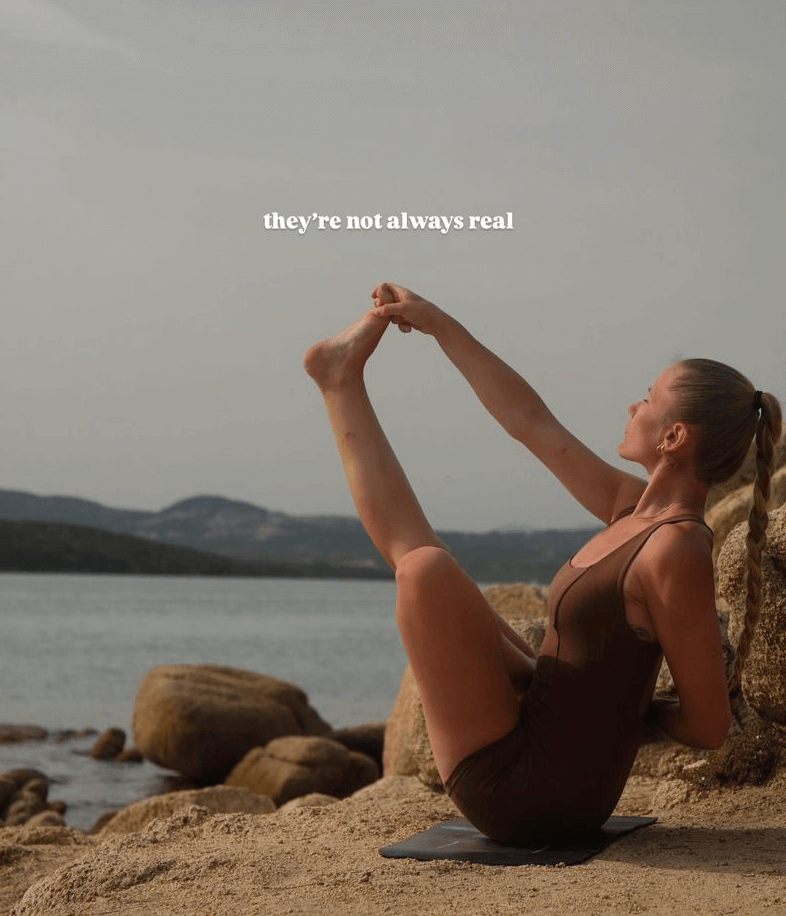 Andrijana Darkov demonstrating Boat pose variation during a yoga class on the beach for collaboration with Monday Body