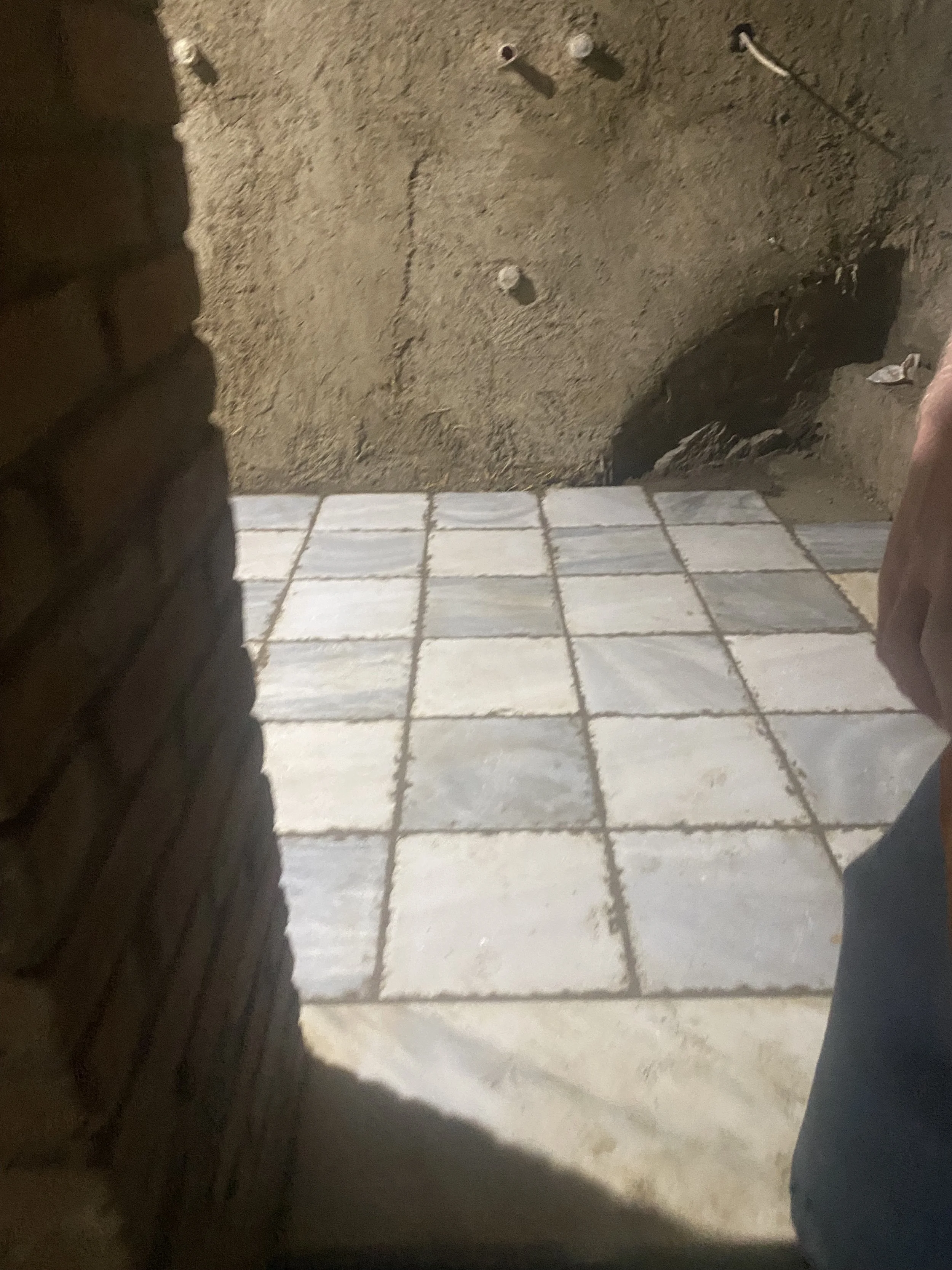 The checkered marble floor