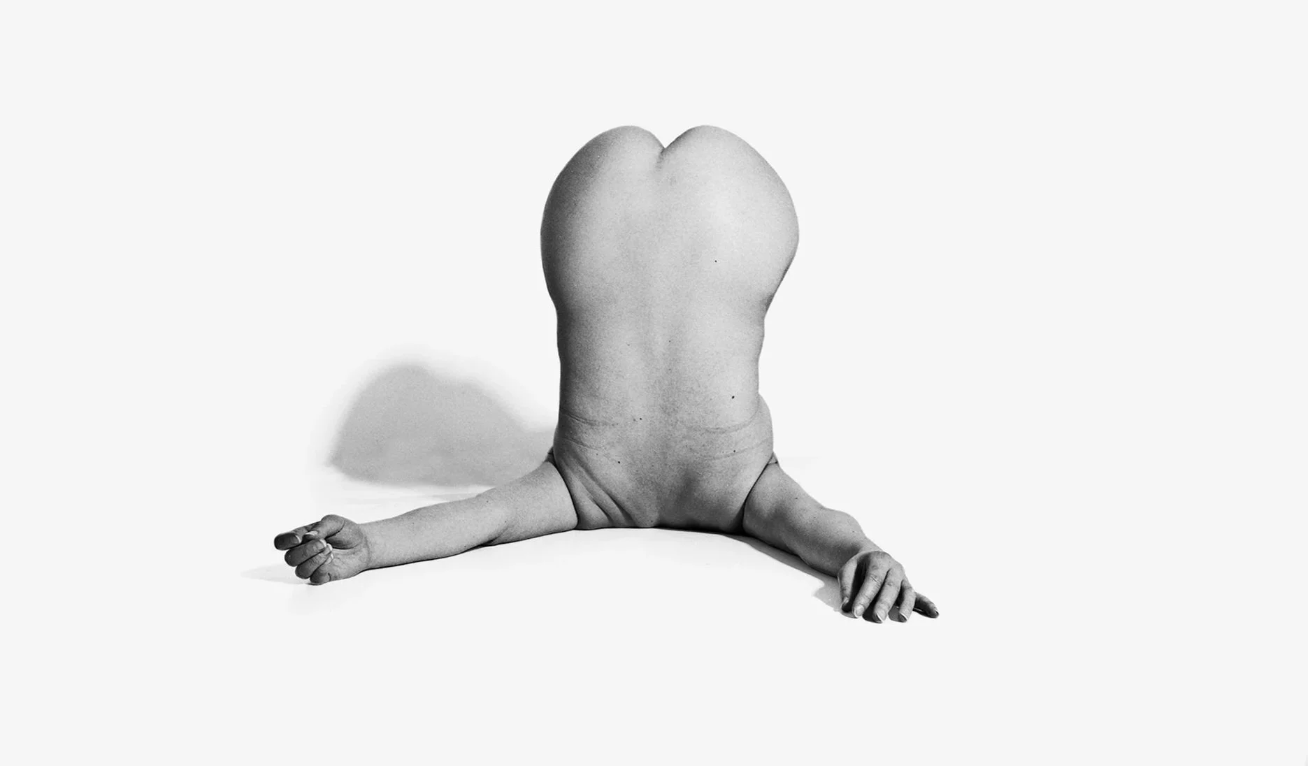 A minimalistic human figure study photograph by Saskatoon based Canadian photographer Chad Coombs. The human form captured in its raw reality.