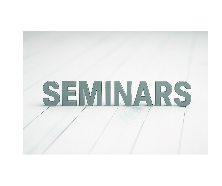 The word 'SEMINARS' in large, 3D letters on a white wooden surface.