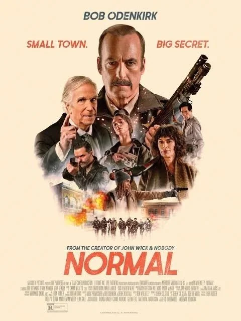 Movie poster for 'Normal' featuring Bob Odenkirk, with characters holding guns and a small town in flames.