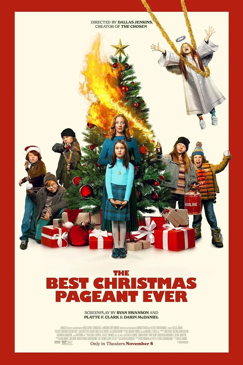 Movie poster for 'The Best Christmas Pageant Ever featuring a Christmas scene with a tree on fire and a group of children with various expressions, and one dressed as an angel floating above the scene, with wrapped presents at the base.