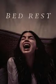 Movie poster for 'Bed Rest' featuring a woman with long dark hair appears to be screaming or shouting in front of a dark wall. The words 'BED REST' are displayed above her head.