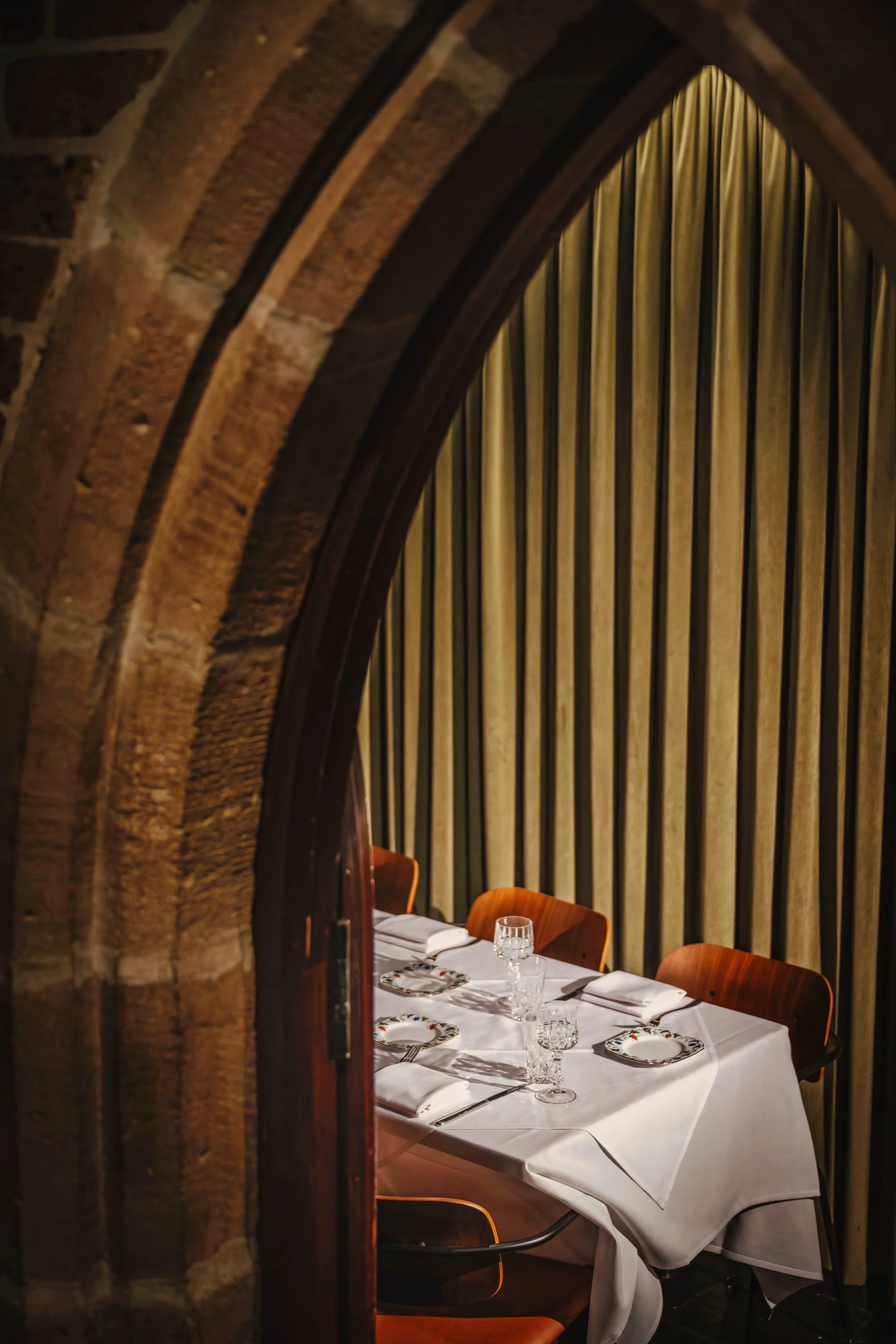 darling-glebe-dybka-private-dining-room-table-through-archway.jpg.webp