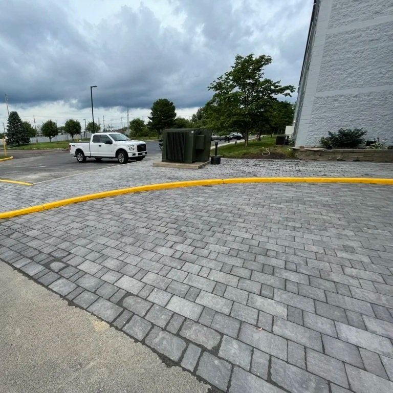 Hotel driveway replacement. Out with concrete, in with brand new pavers for the driveway and sidewalks.
