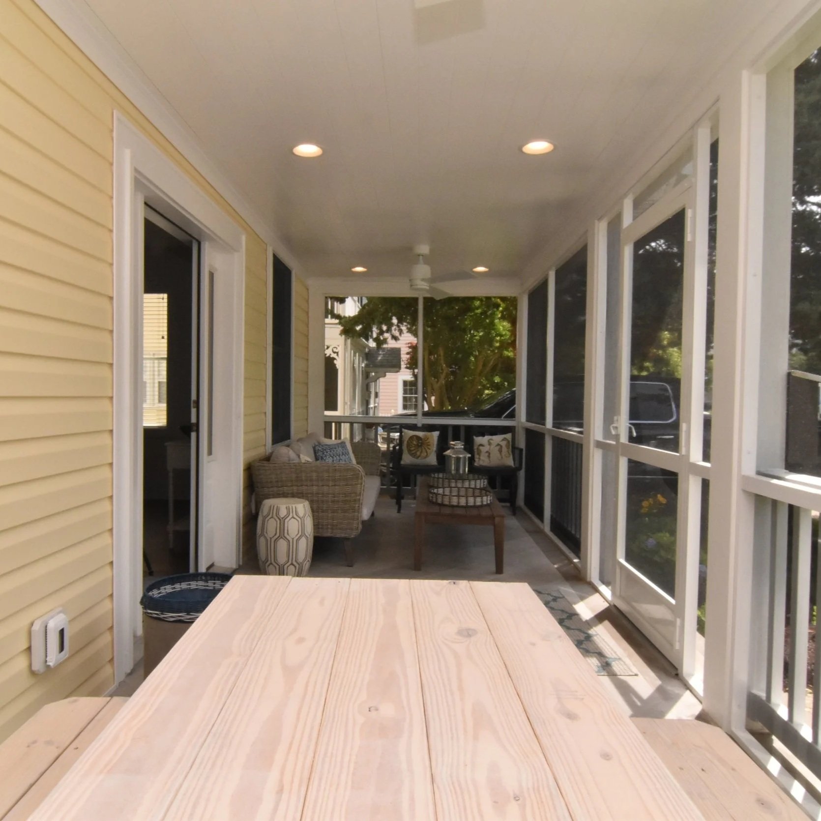 Front screened porch for a relaxing afternoon by the beach, built in Rehoboth Beach, Delaware.