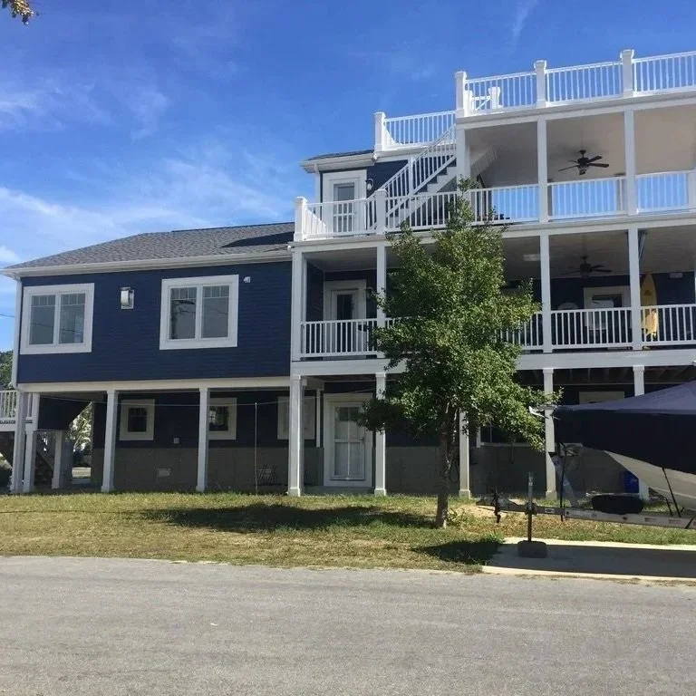 Multi-level deck with rooftop view of the ocean in Lewes Beach, Delaware.