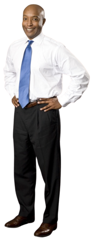 A smiling man in a white dress shirt and blue tie, standing with hands on hips against a black background.