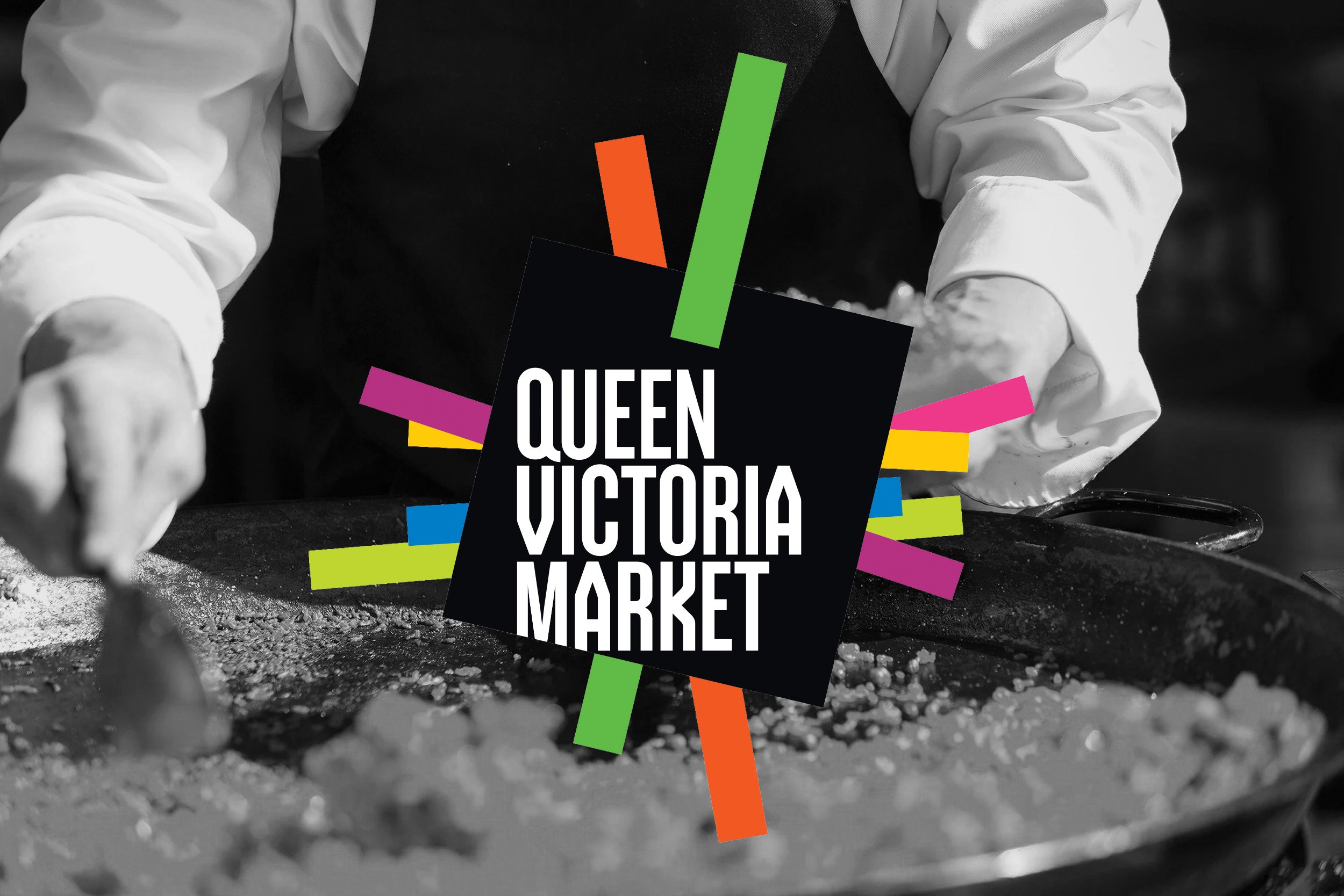 A black and white photo of someone cooking or preparing food on a large flat metal surface, with colorful graphic elements and a black square overlaying the image, containing the text 'Queen Victoria Market' in white letters.