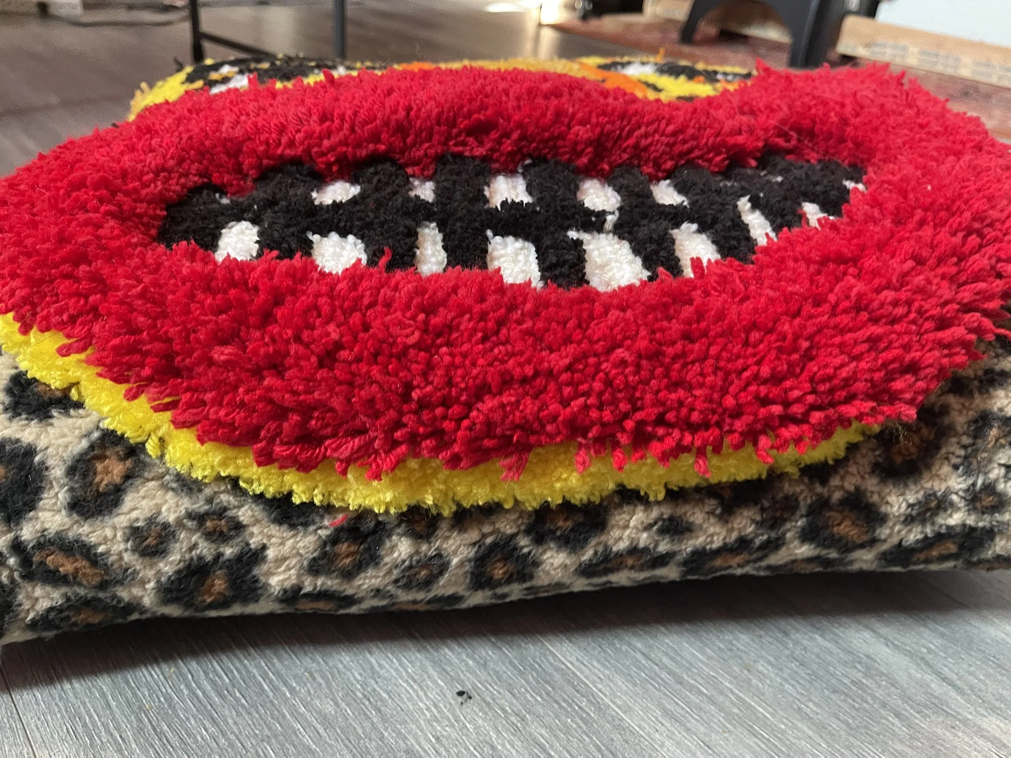 lana guerra, tufted cat pillow 8, 2026. crude things ew.jpg