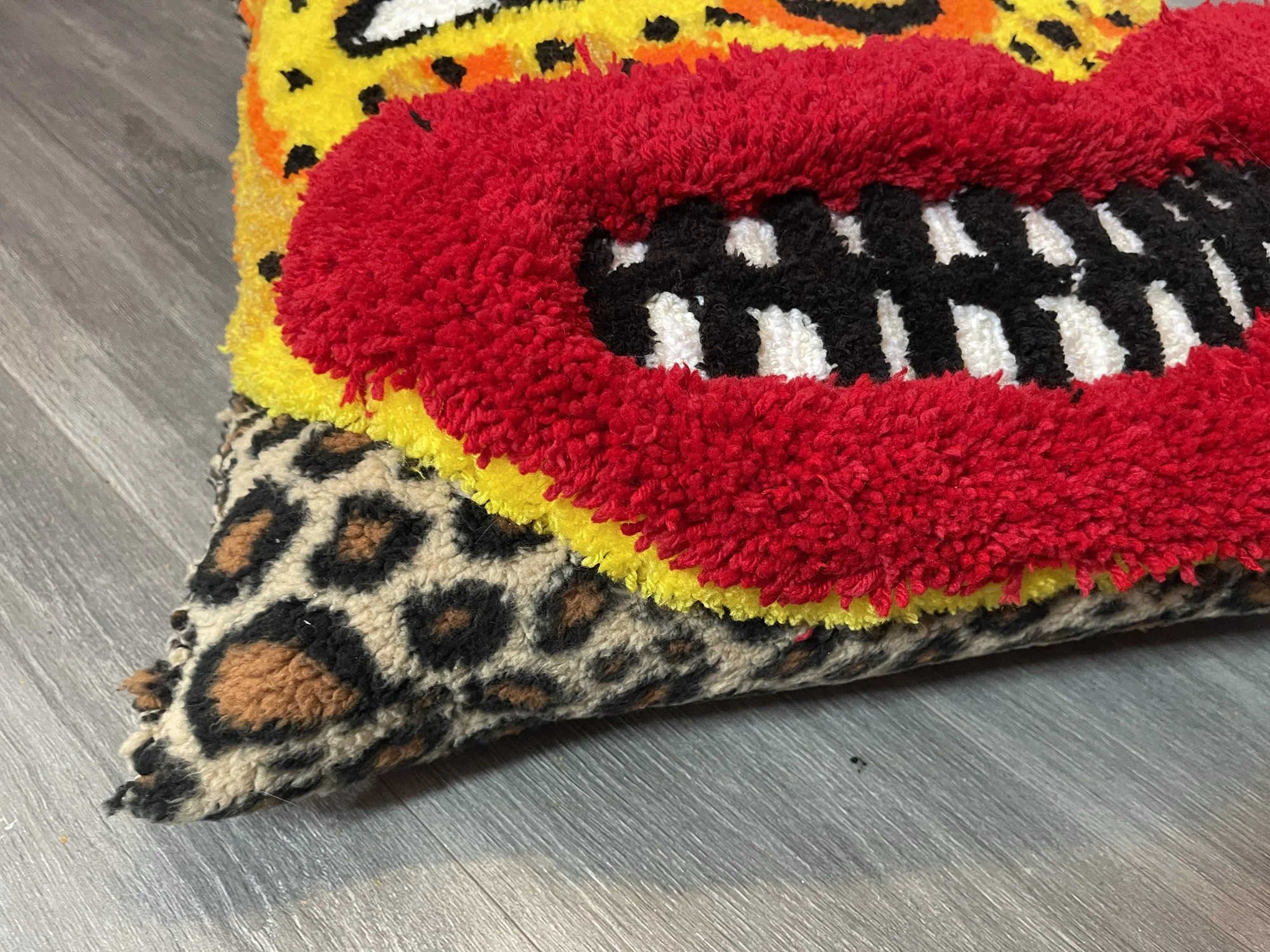 lana guerra, tufted cat pillow 9, 2026. crude things ew.jpg