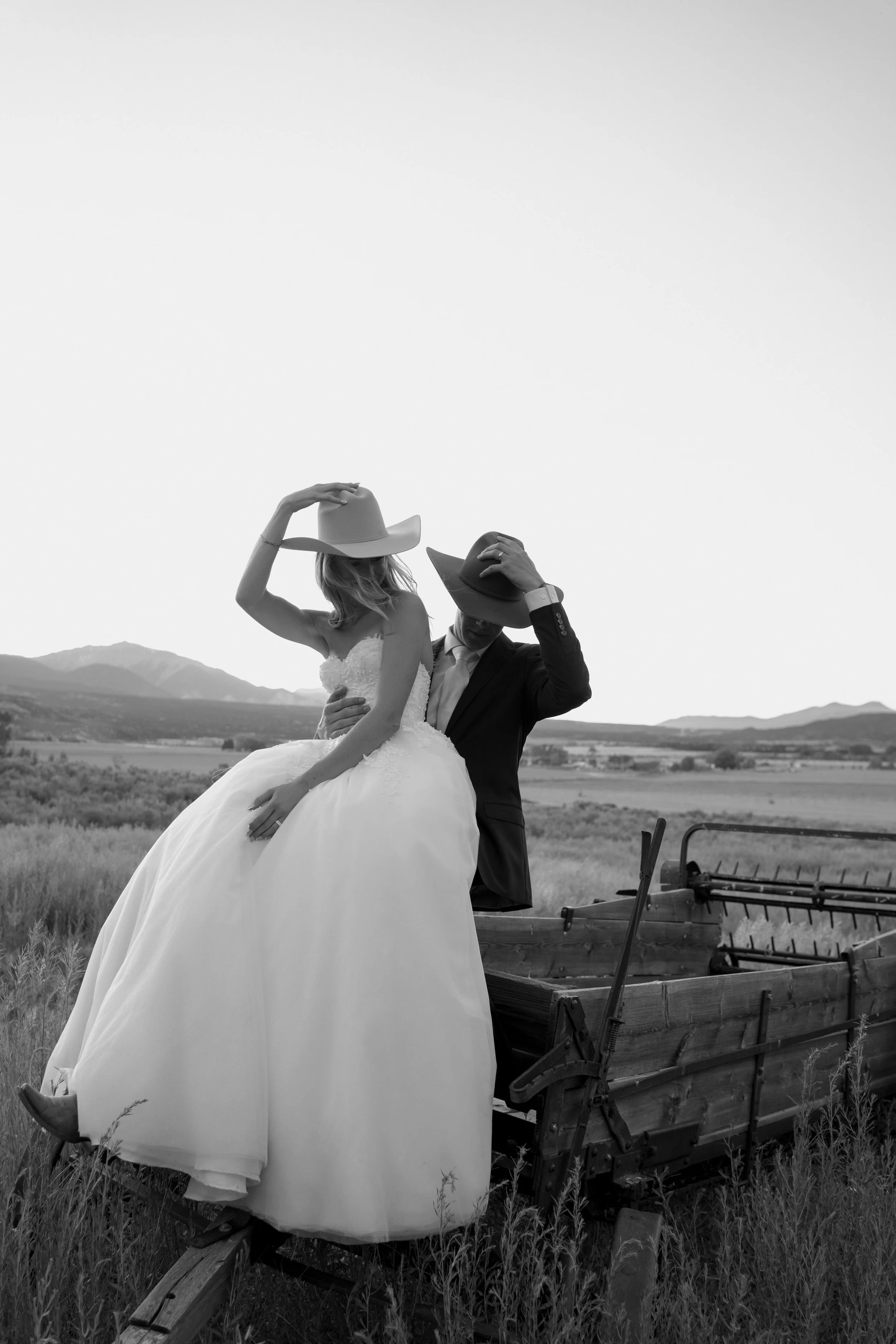 Bride and groom sharing a quiet moment during a mountain wedding in Colorado, photographed in black and white.