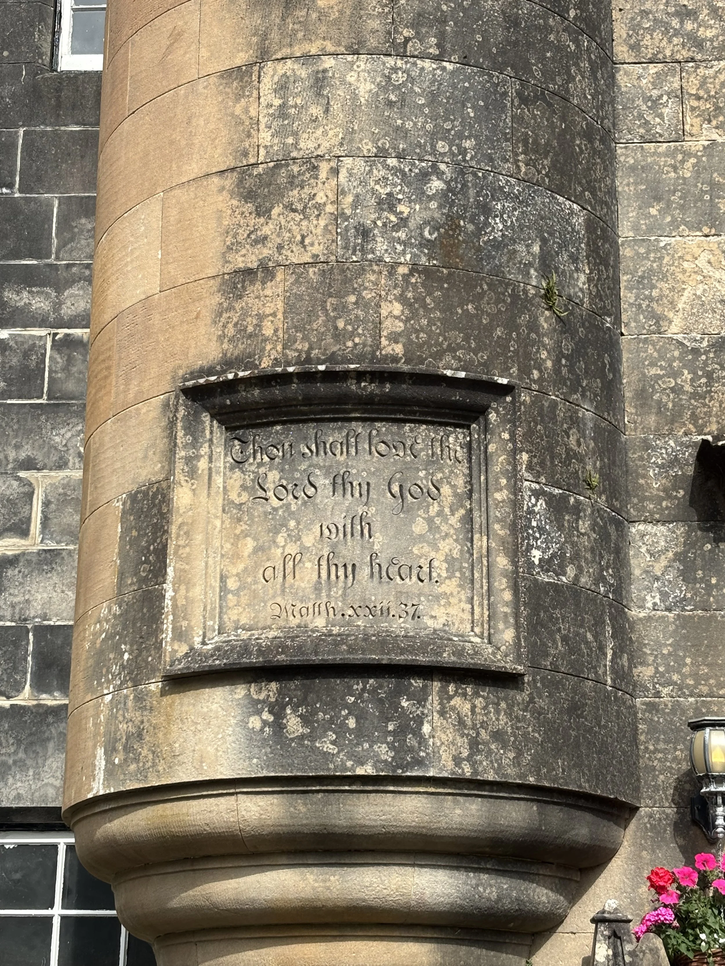 Left Entry Carving: "Thou shalt love the Lord thy God with all thy heart."