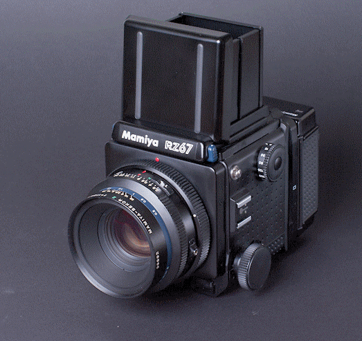 A vintage Mamiya RZ67 medium format film camera with a waist-level viewfinder attached.