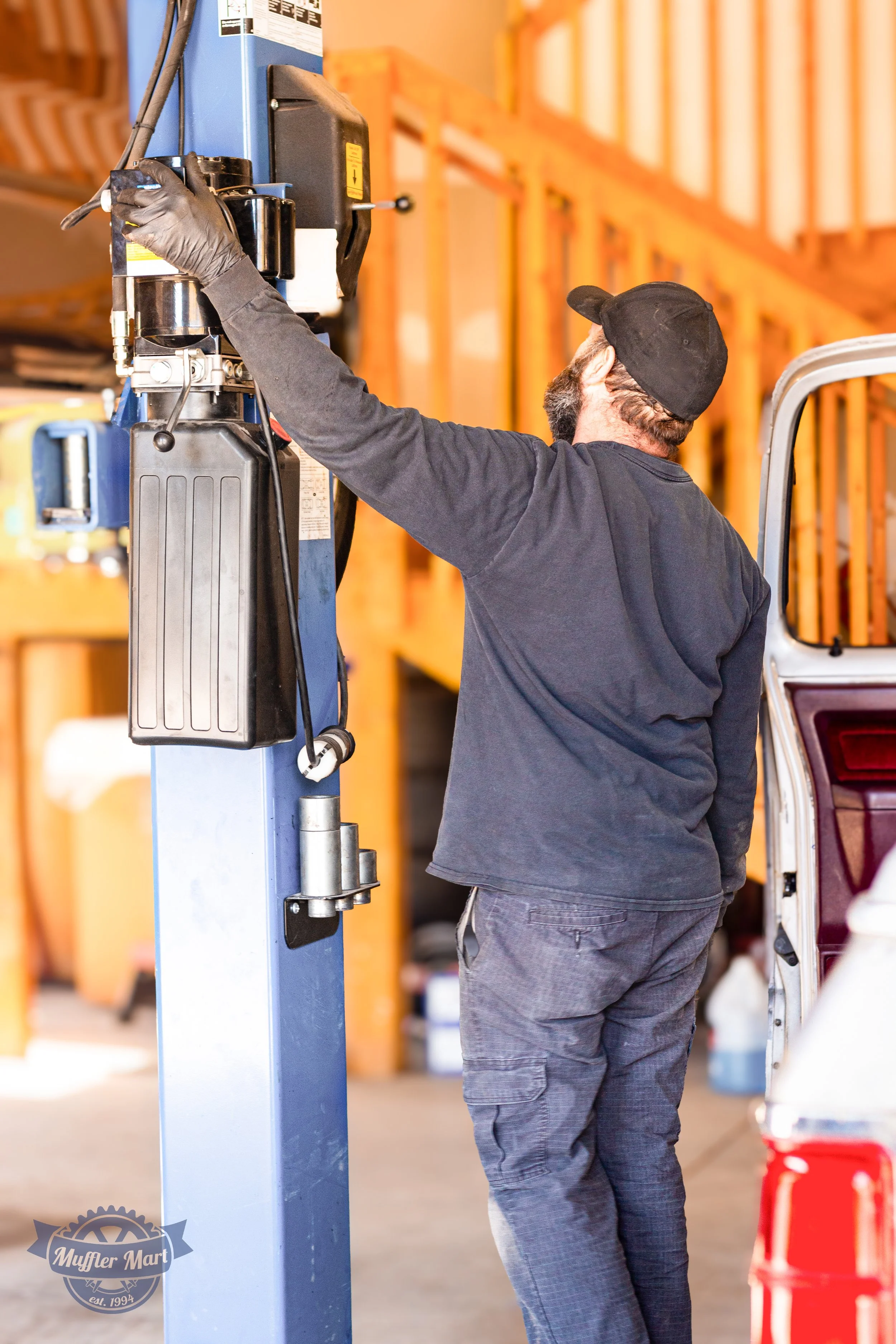 John Morgan - Muffler Mart-BackMechanic11.jpg