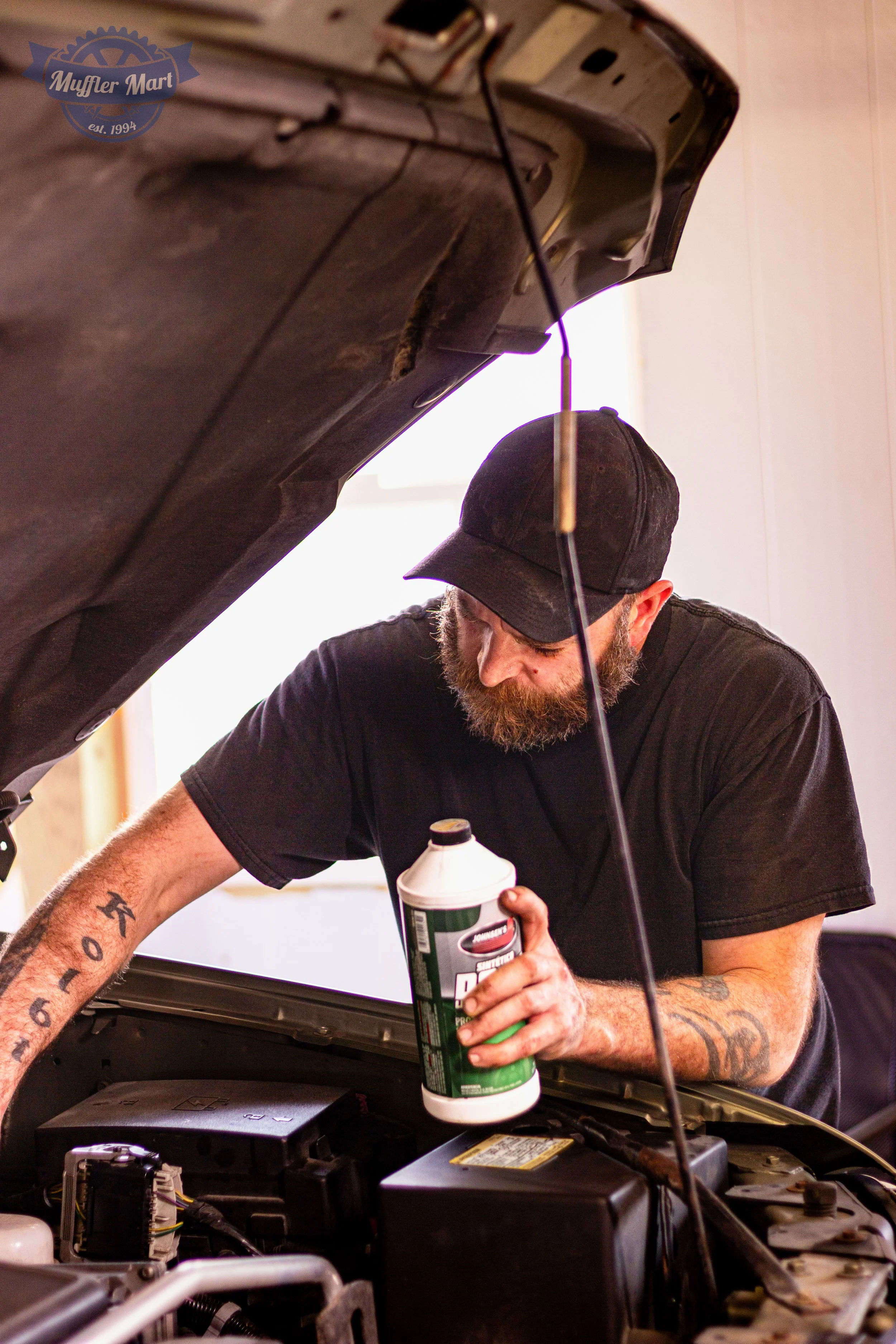 John Morgan - Muffler Mart-BackMechanic3.jpg