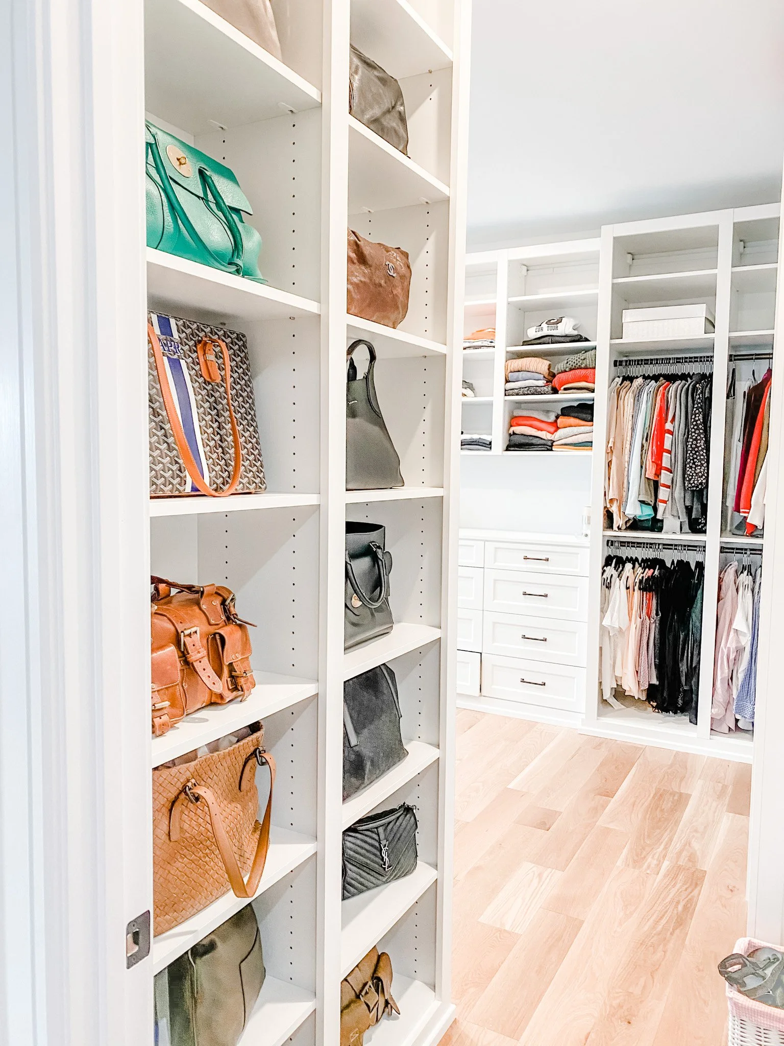 Clean handbag display and organized closet system preserved with regular home organization maintenance.