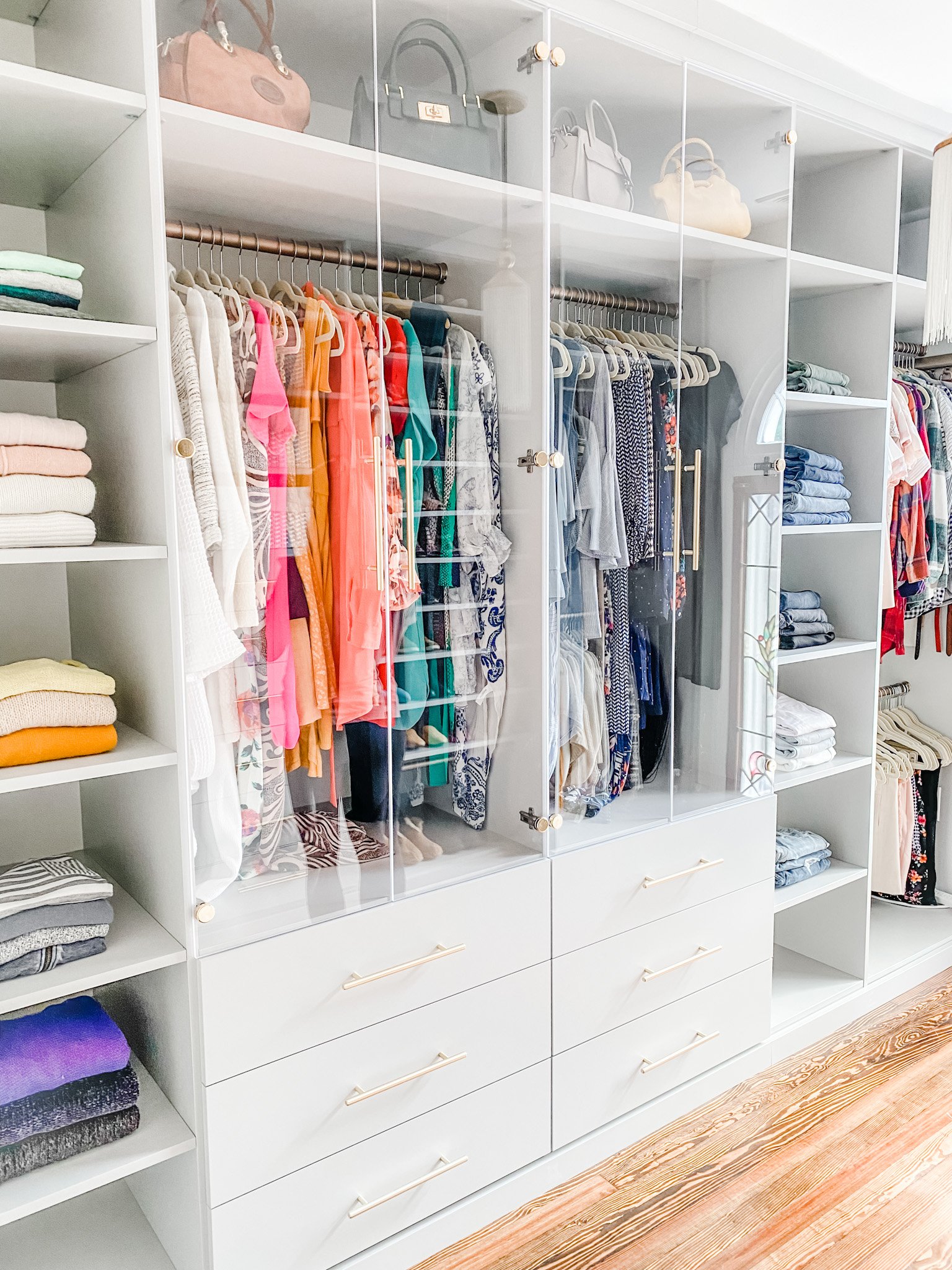 A beautifully organized custom closet showcasing the clean results of proper home system upkeep OC.