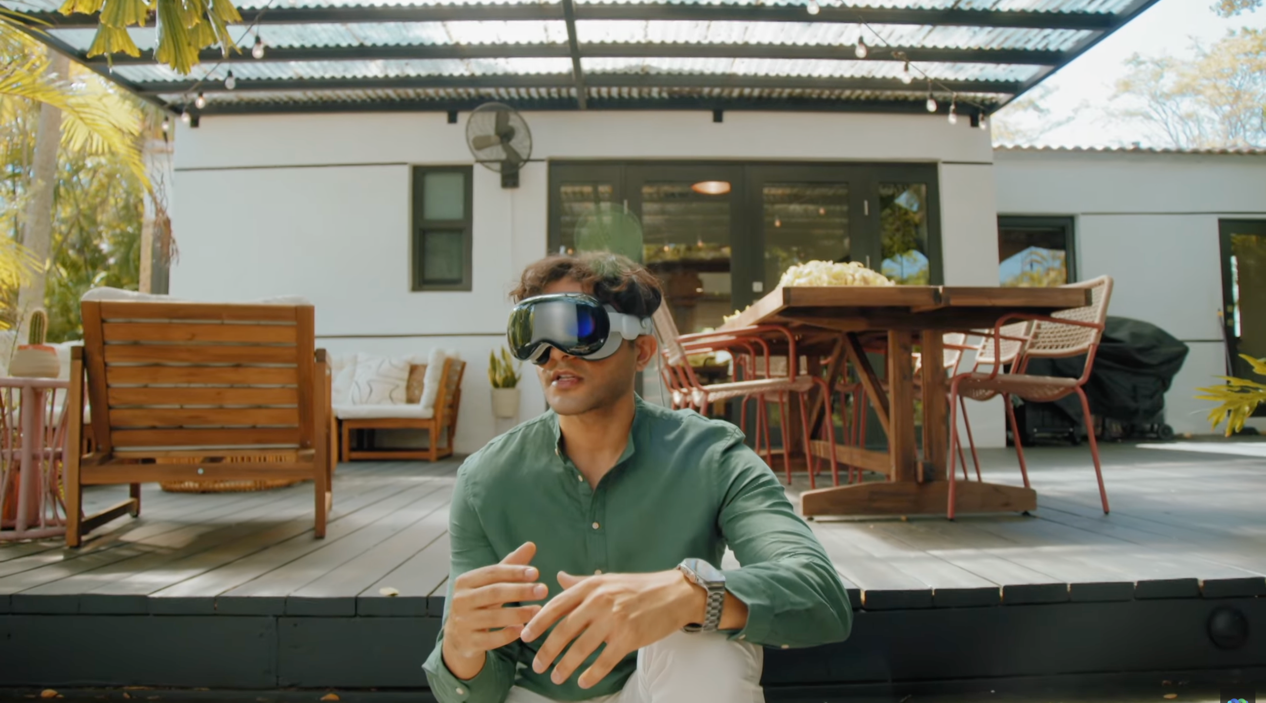 Spatial video production directed by ST Davis for Cisco Webex — Apple Vision Pro user on an outdoor deck interacting with virtual workspace in a residential setting