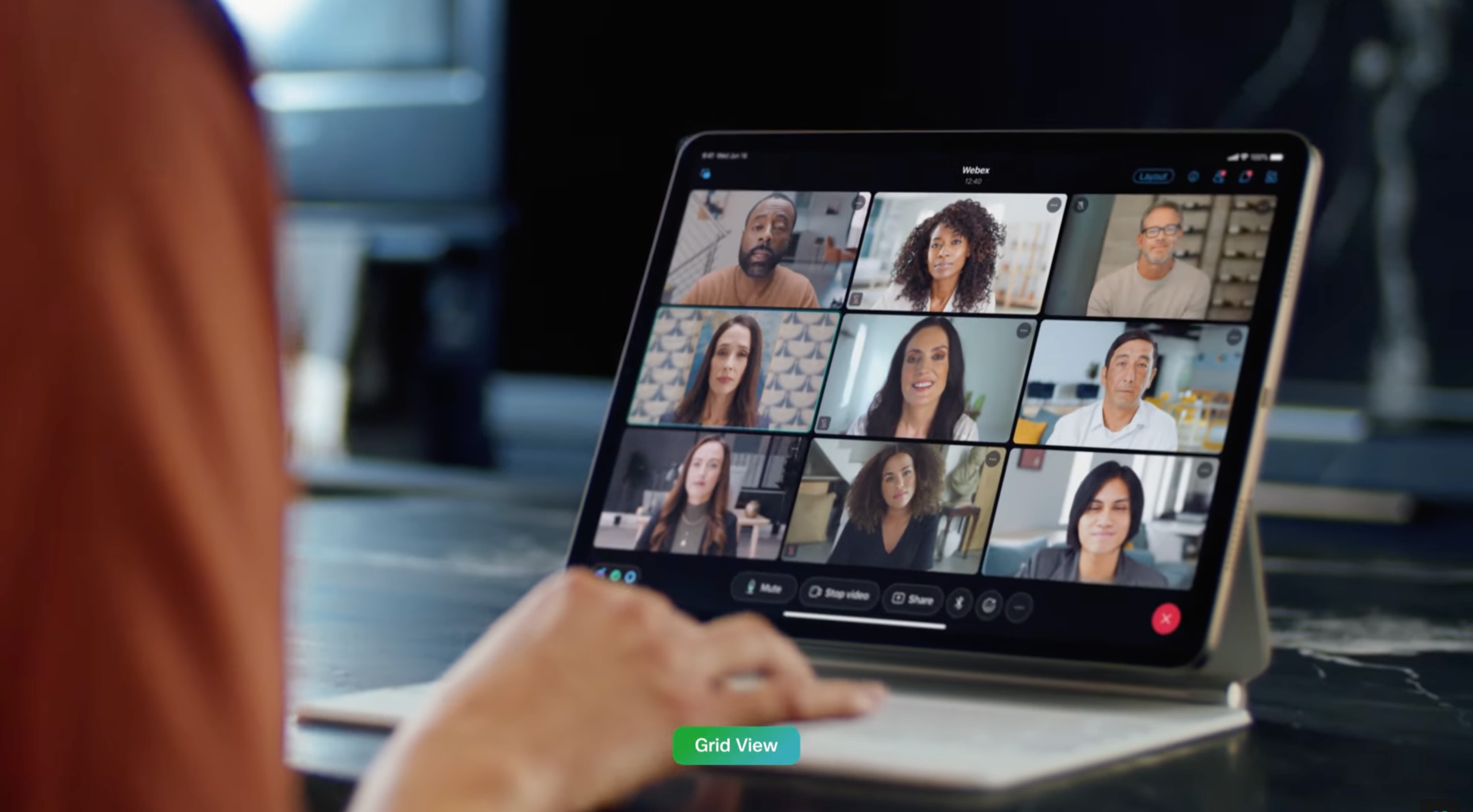 Product commercial directed by ST Davis for Apple — tablet displaying a multi-participant video call with natural soft lighting