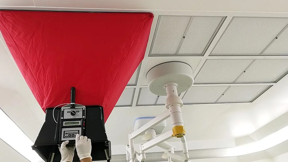 Technician performing air measurement