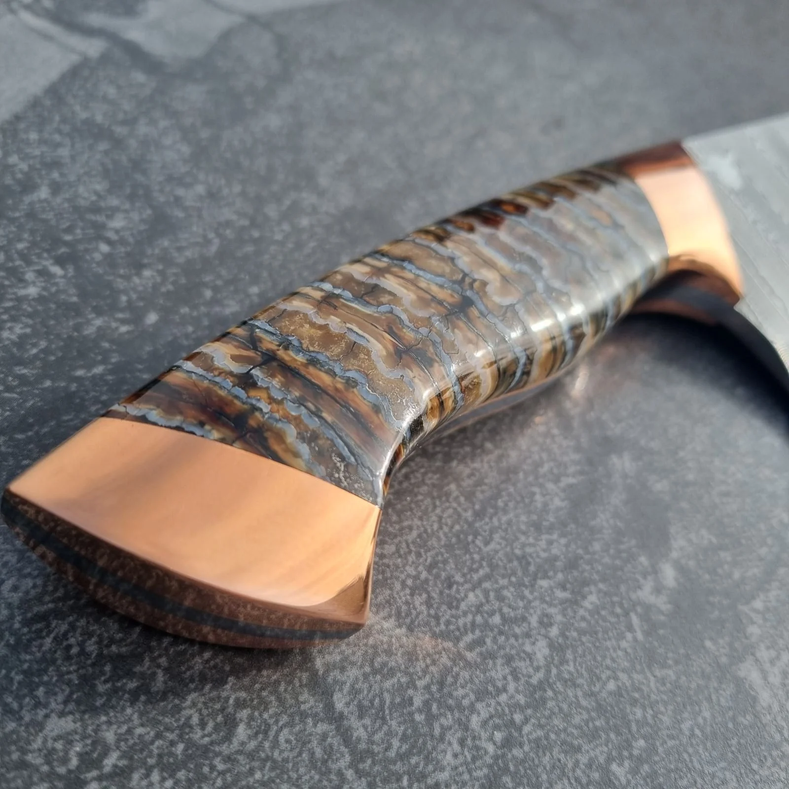 copper mammoth tooth handle.jpg