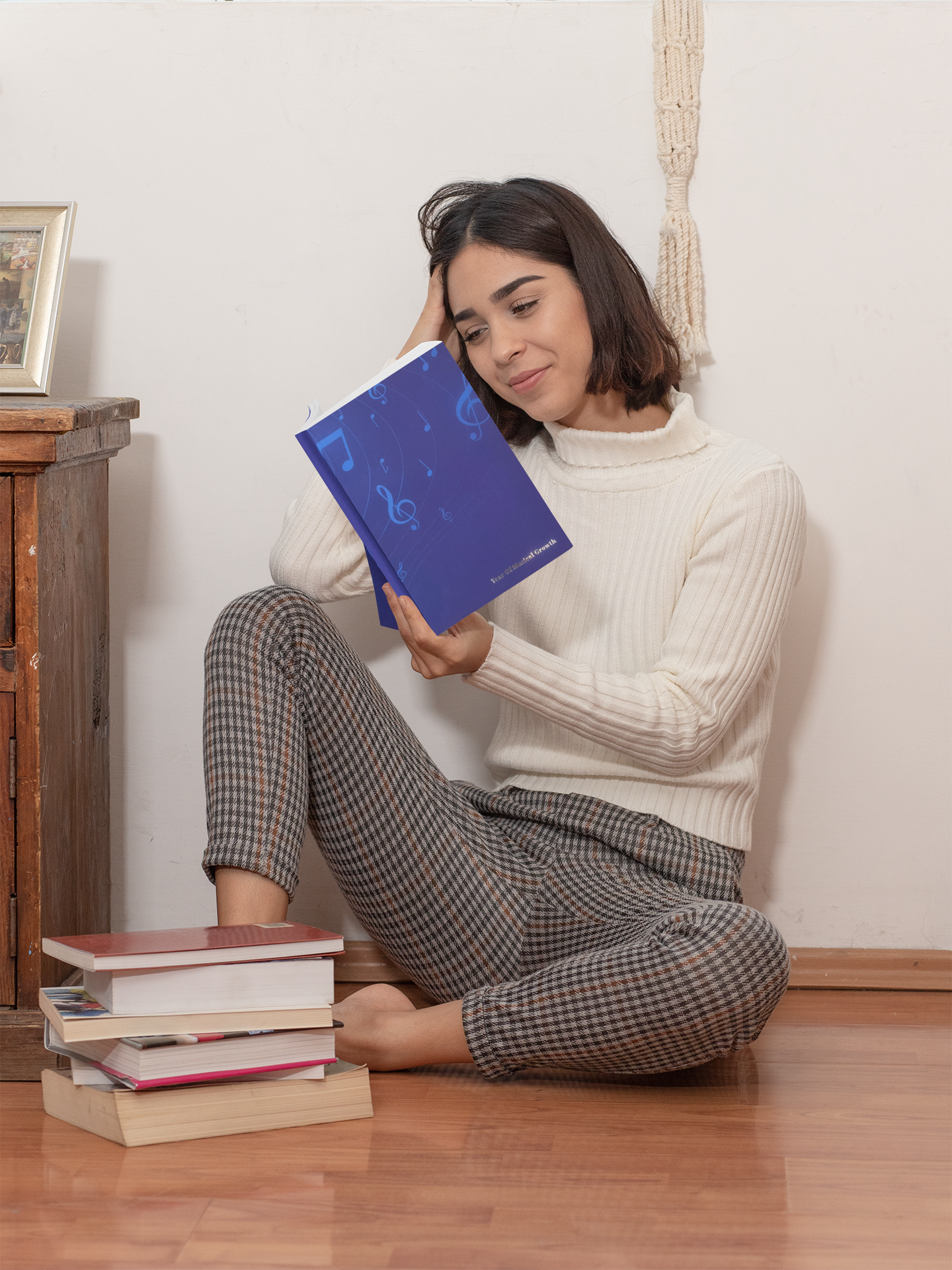 mockup-of-a-woman-reading-a-book-at-home-31040.png