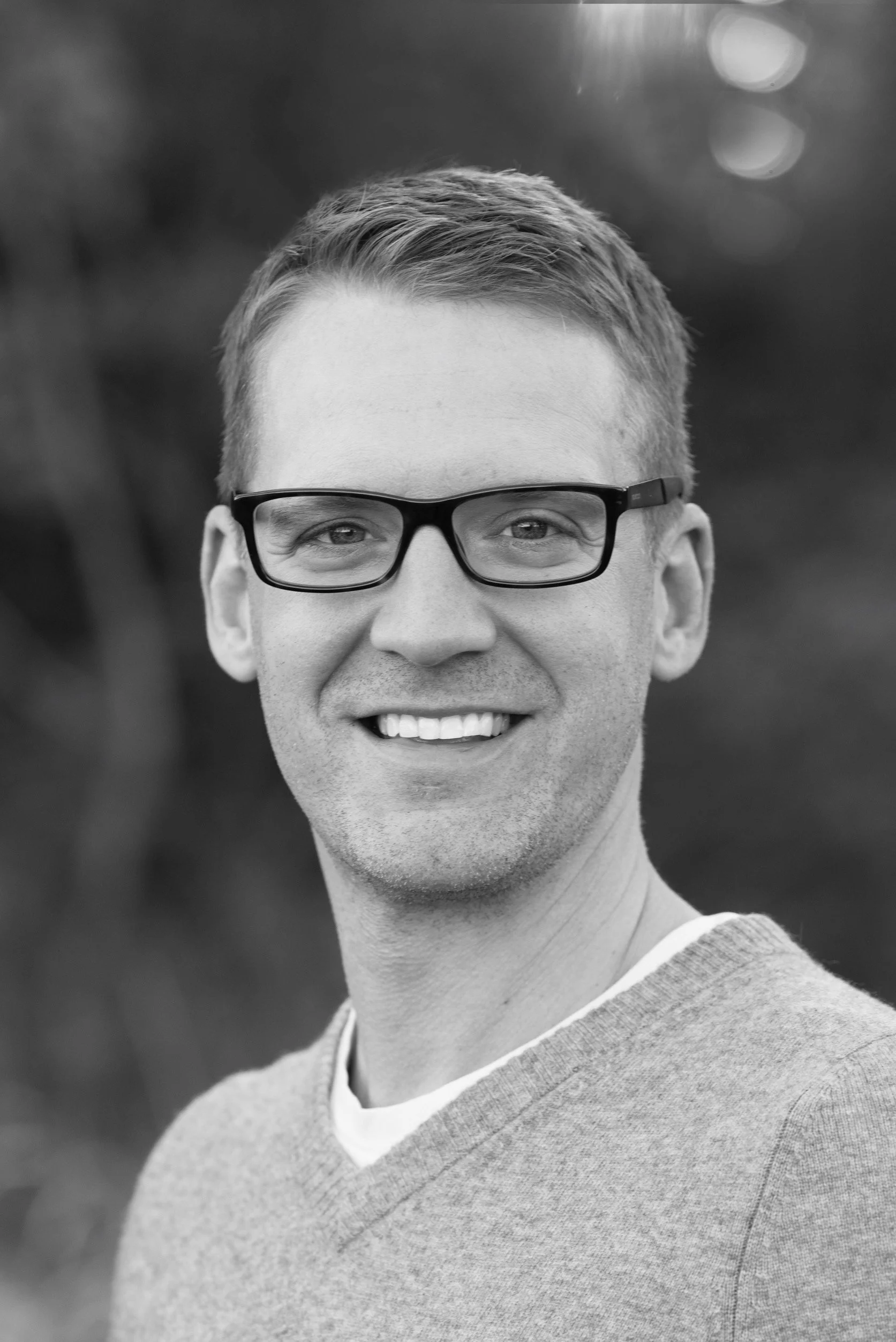 Eric Duerksen, senior HR executive and fractional CHRO advisor, smiling in a black and white portrait.