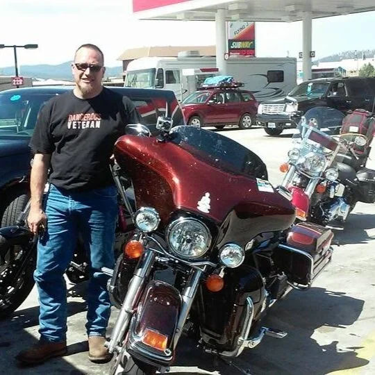 tom with bagger.webp