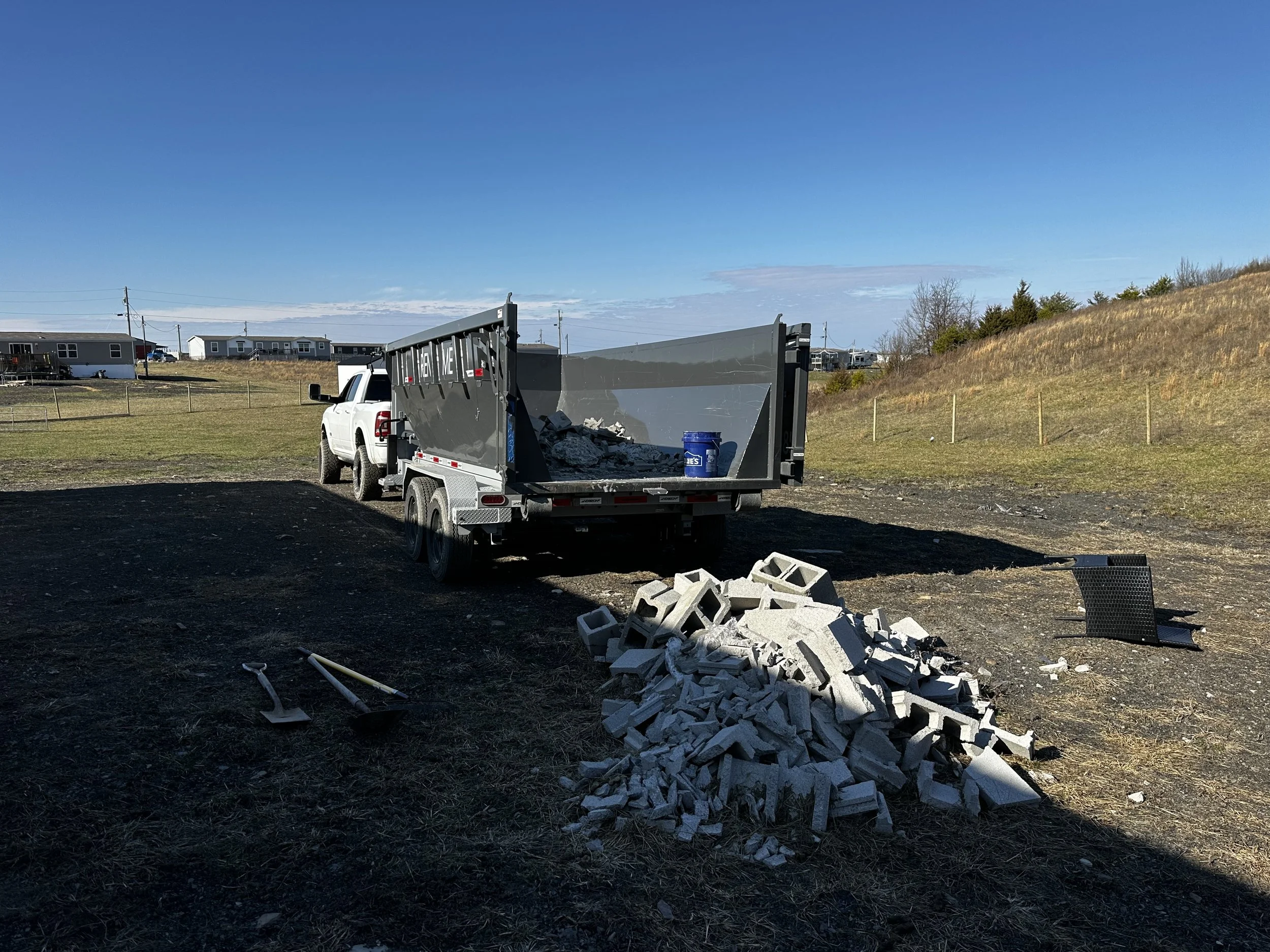 Busted up cinder block junk removal for a residential customer in East Bernstadt, KY