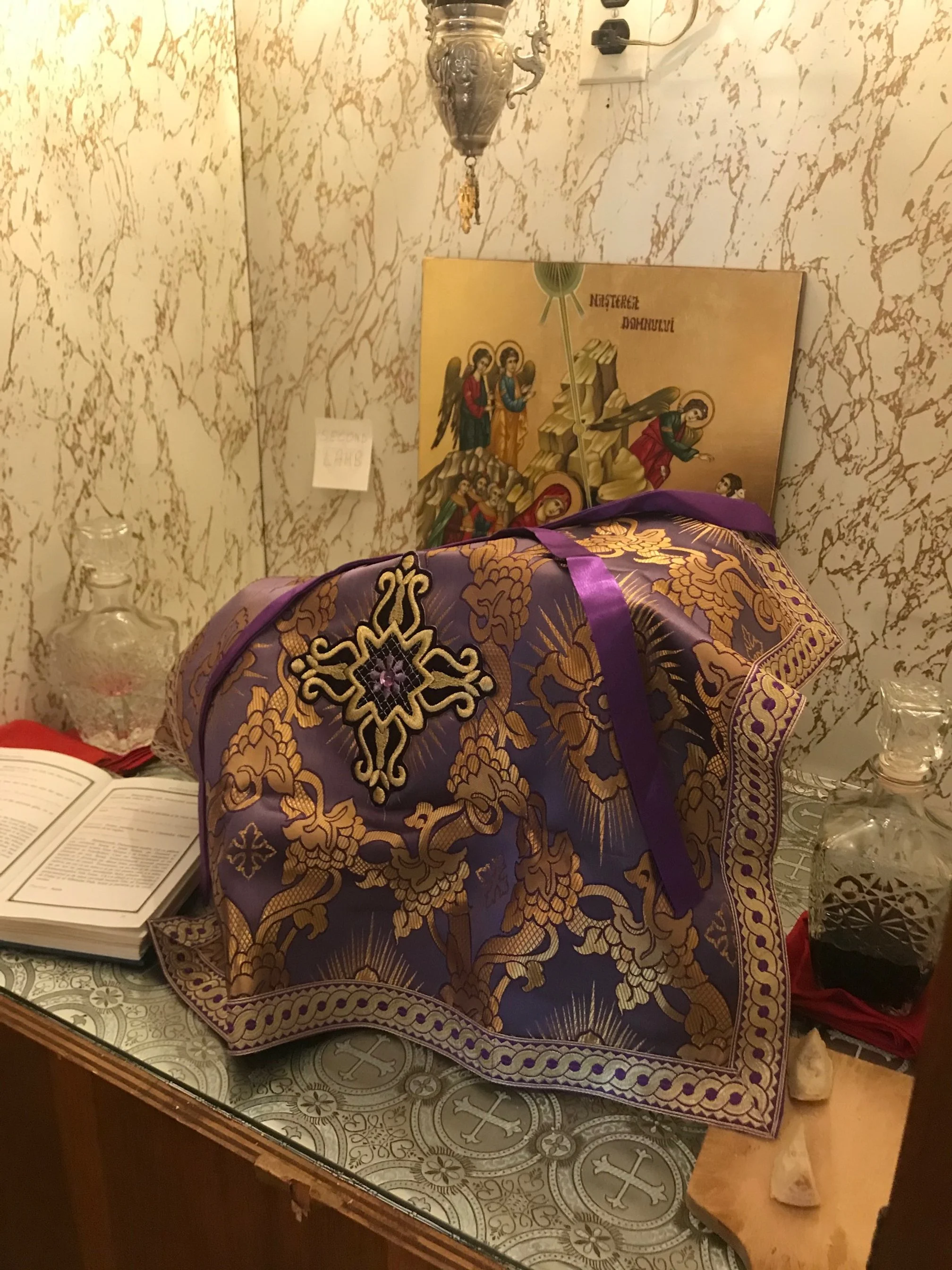 The bread and the cup prepared and wrapped with aēr in Proskomidi.