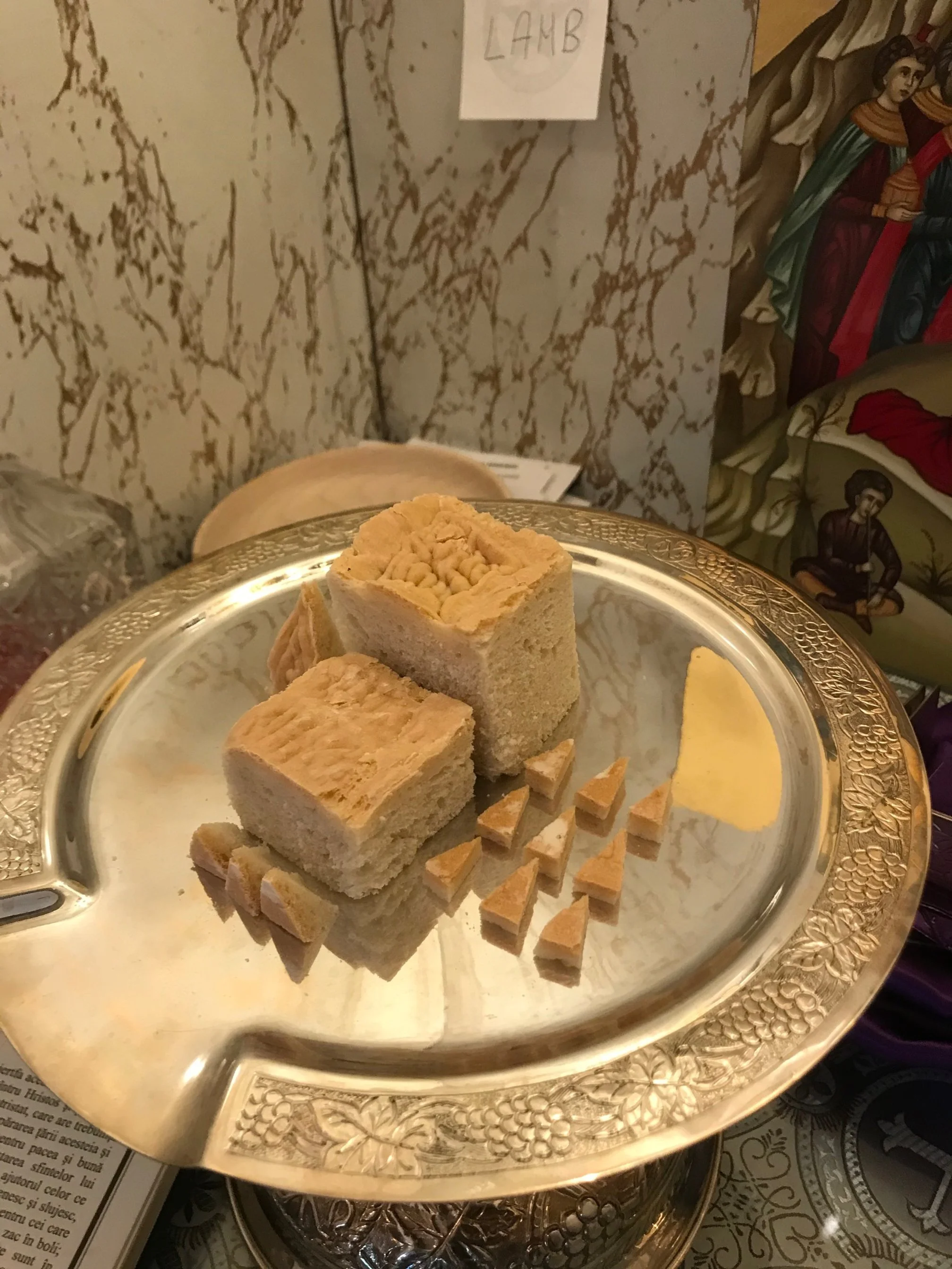 Prosphora bread cut in the arrangement for offering.