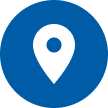 Map pin icon with a white center on a blue background