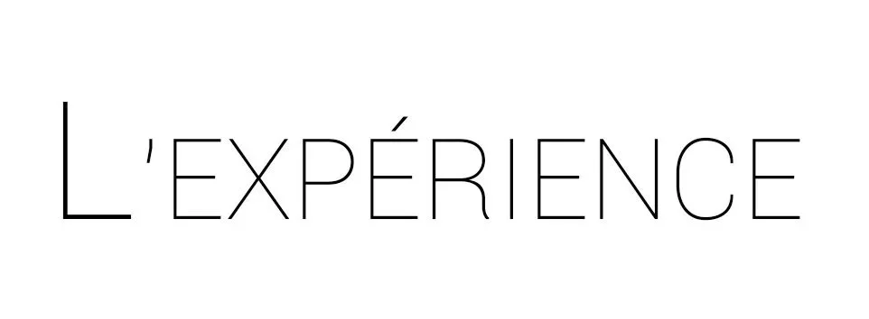 Text reads 'L'EXPÉRIENCE' in a minimalist font on a white background.