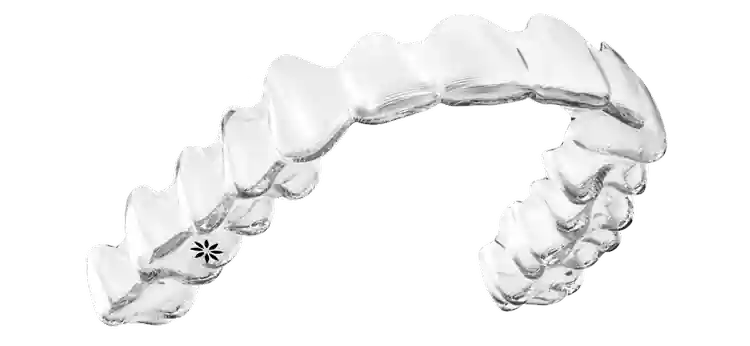 A clear dental aligner or retainer on a black background.