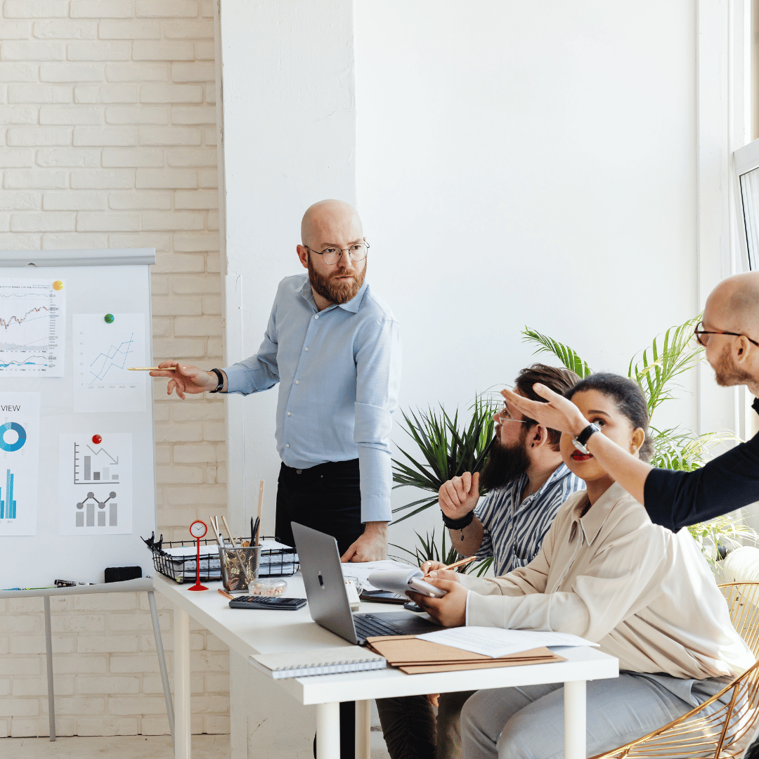 Facilities Management Services Team discussing using Ovrsite Atlas for their building data capture