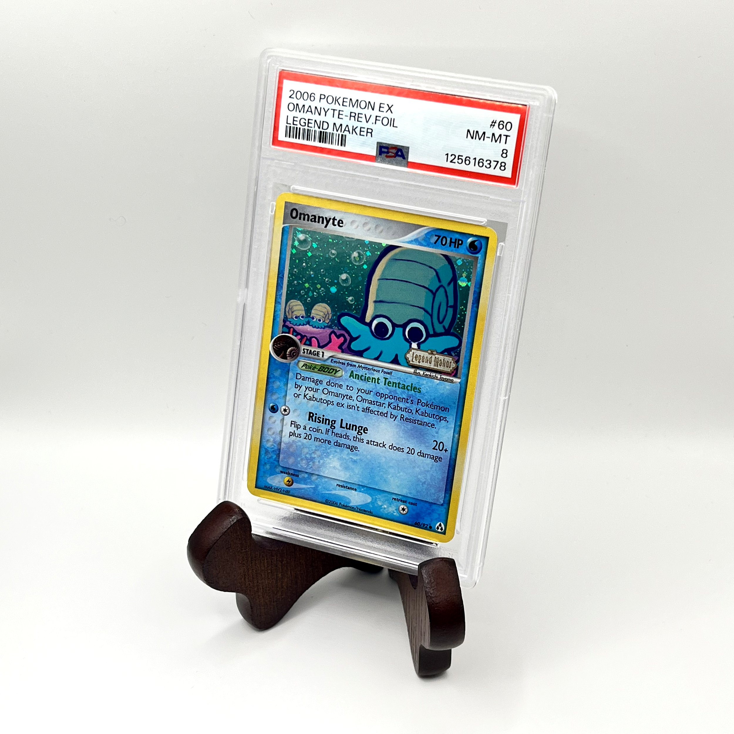 2006 Omanyte Stamped Reverse Foil PSA 8