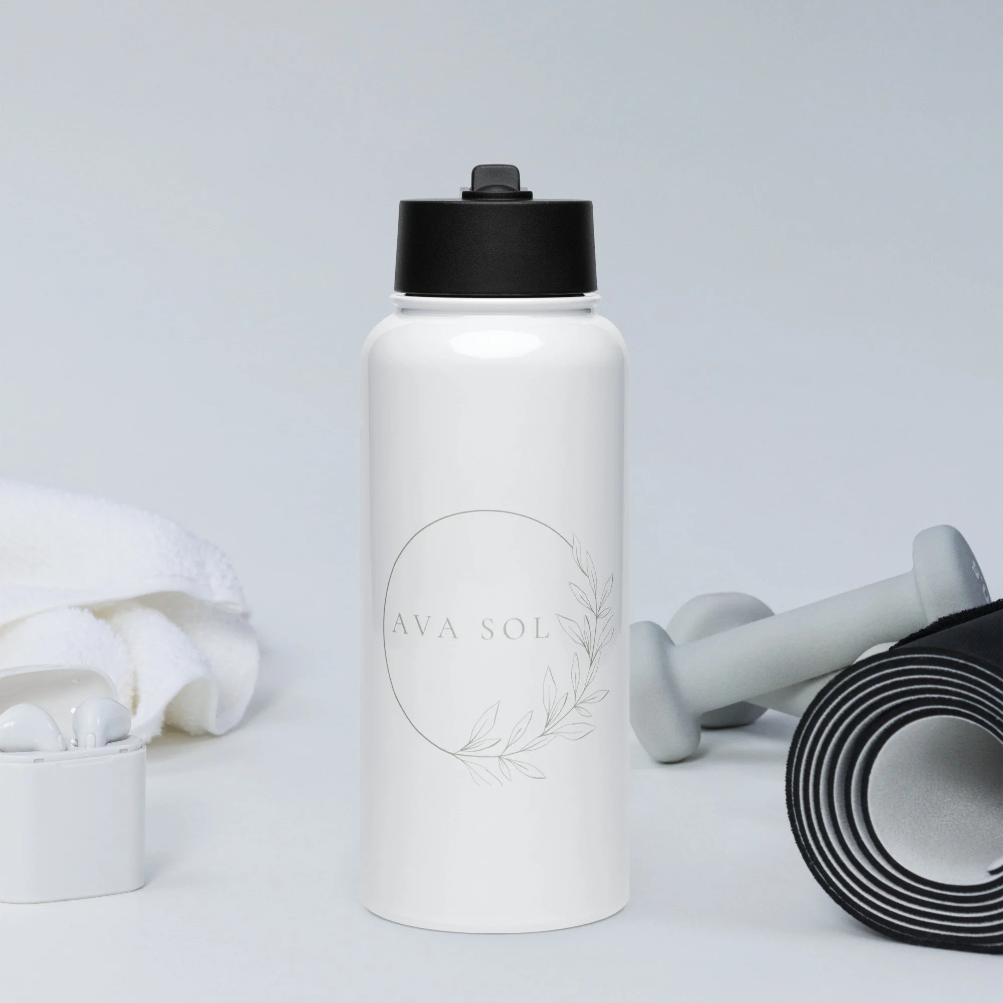 Stainless steel water bottle with a straw lid