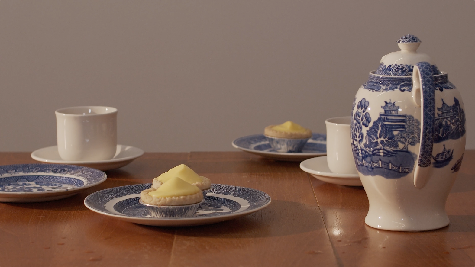 a side on view of a table set for a teaparty
