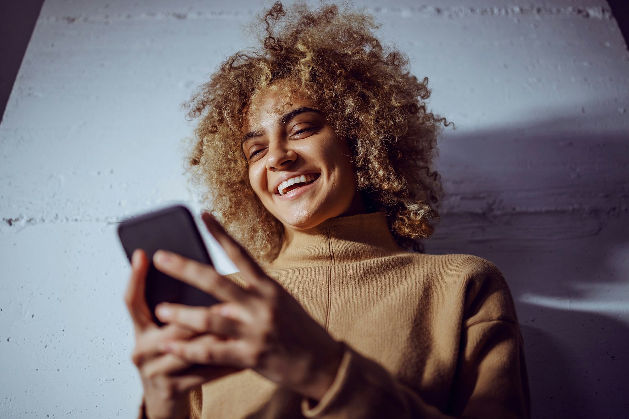 happy woman using phone
