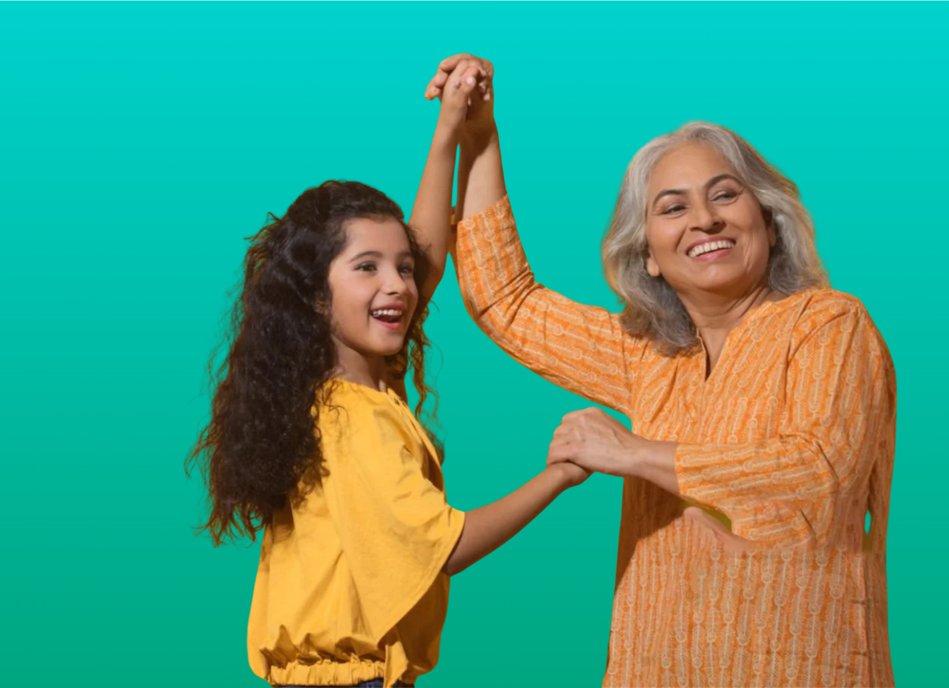 A young girl and an older woman smiling and holding hands in a high five against a teal background.